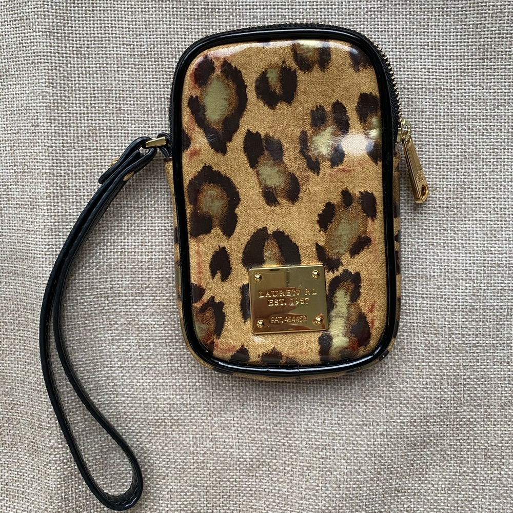 Cell phone case or change purse.